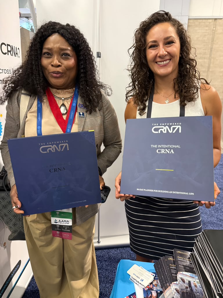 Two CRNAs holding The Intentional CRNA journal